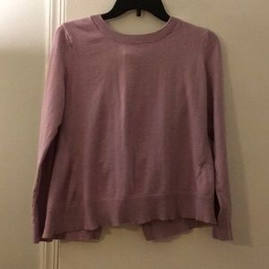 The mullet of sweaters business in the front party in the back Just worn once